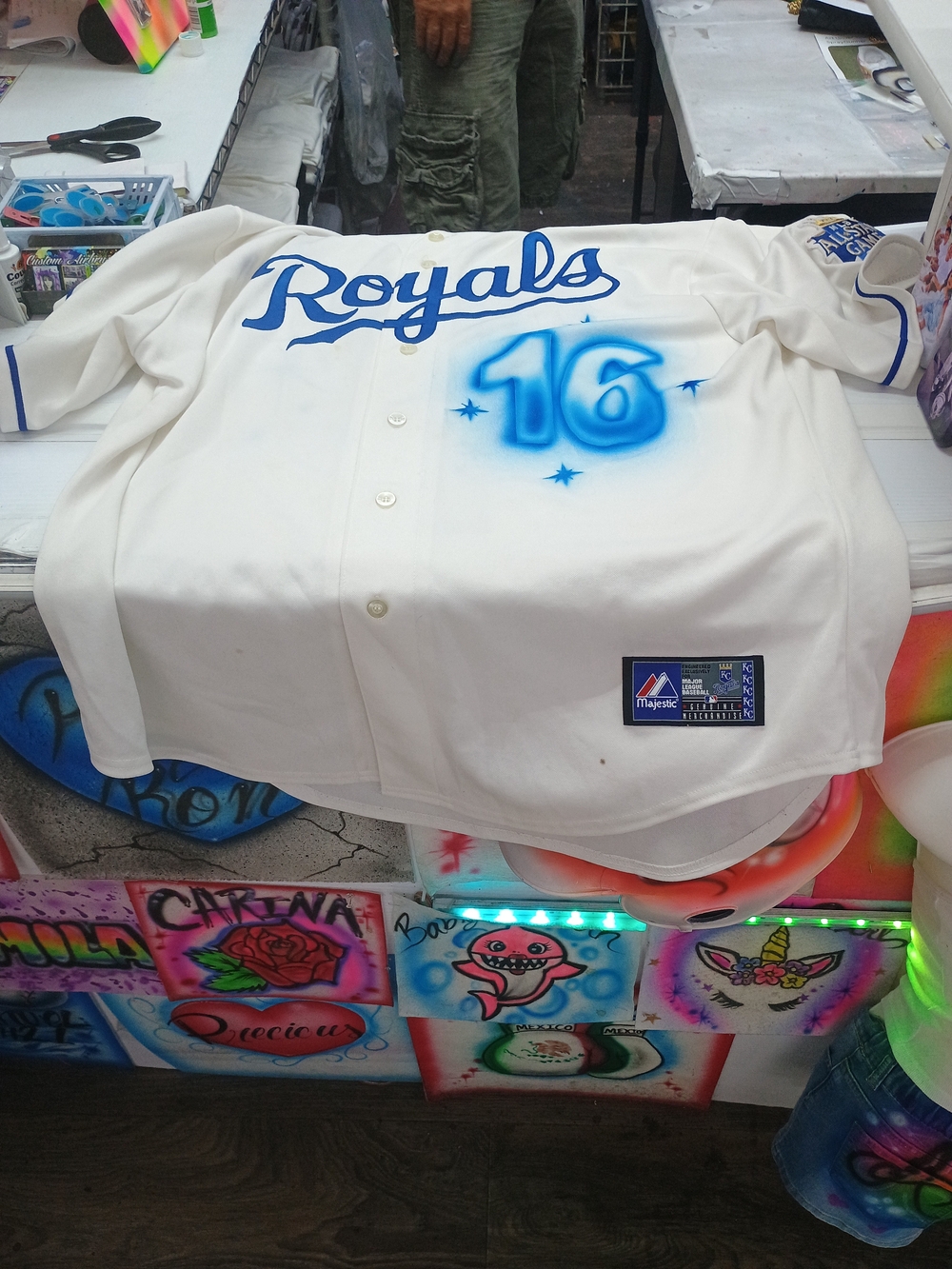 Majestic Royals Cream Jersey with Blue Script and Airbrushed 16